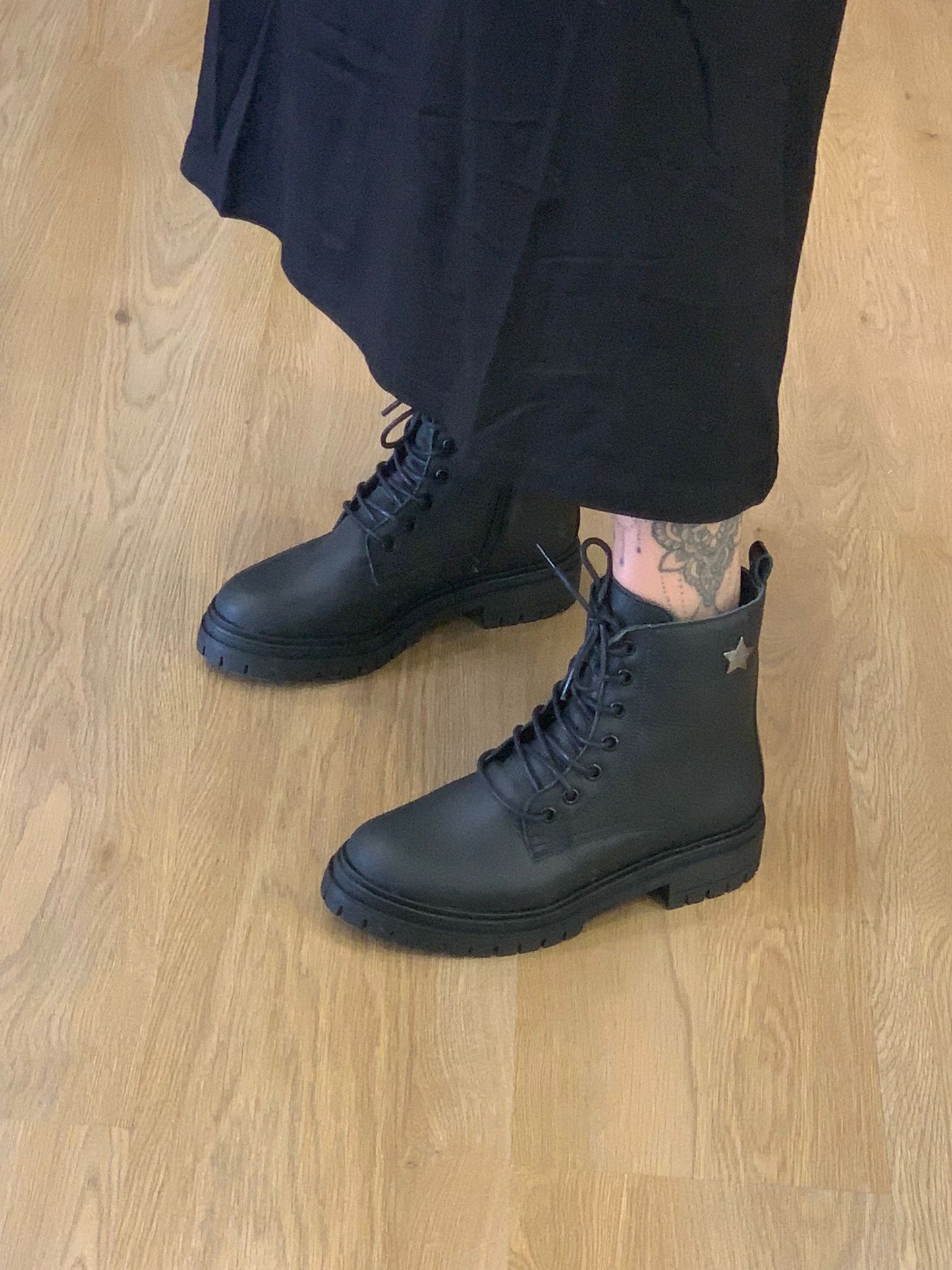 Botas Pretas em Pele